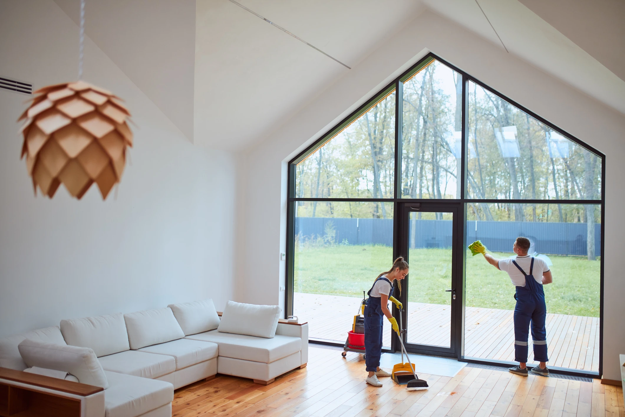 Professional cleaner preparing a bright home interior