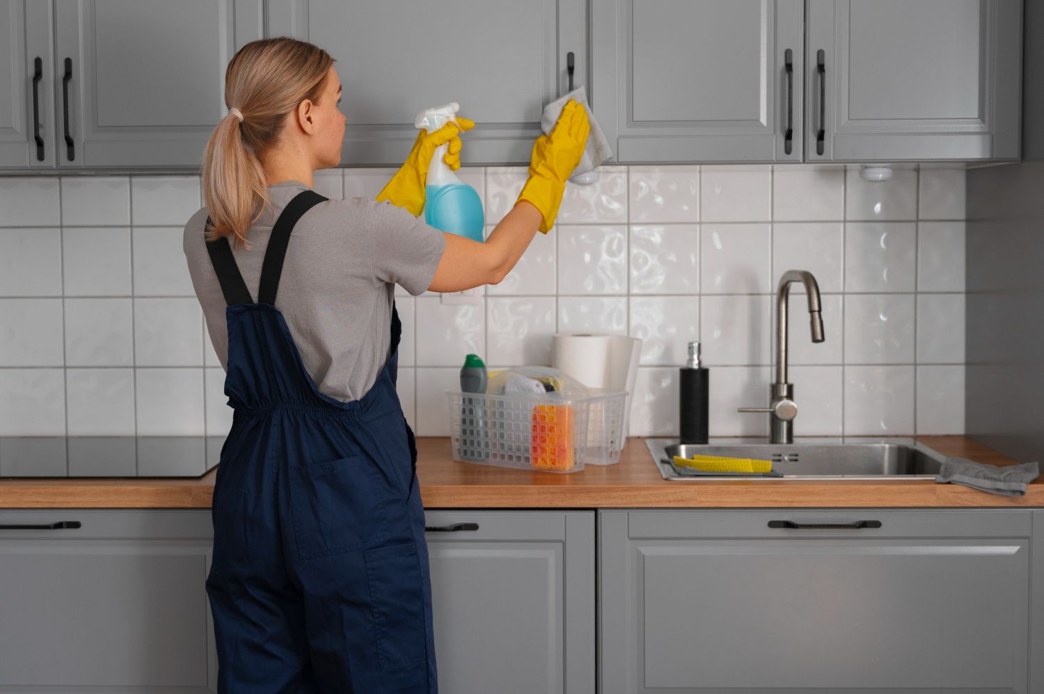 Professional cleaner preparing a bright room for a detailed cleaning service